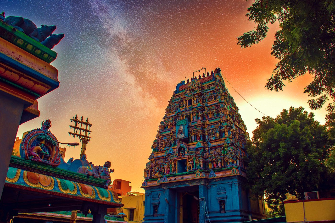 A carved temple tower in Tamil Nadu at dusk